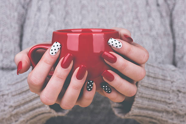 Red nail art ideas image woman holding cup